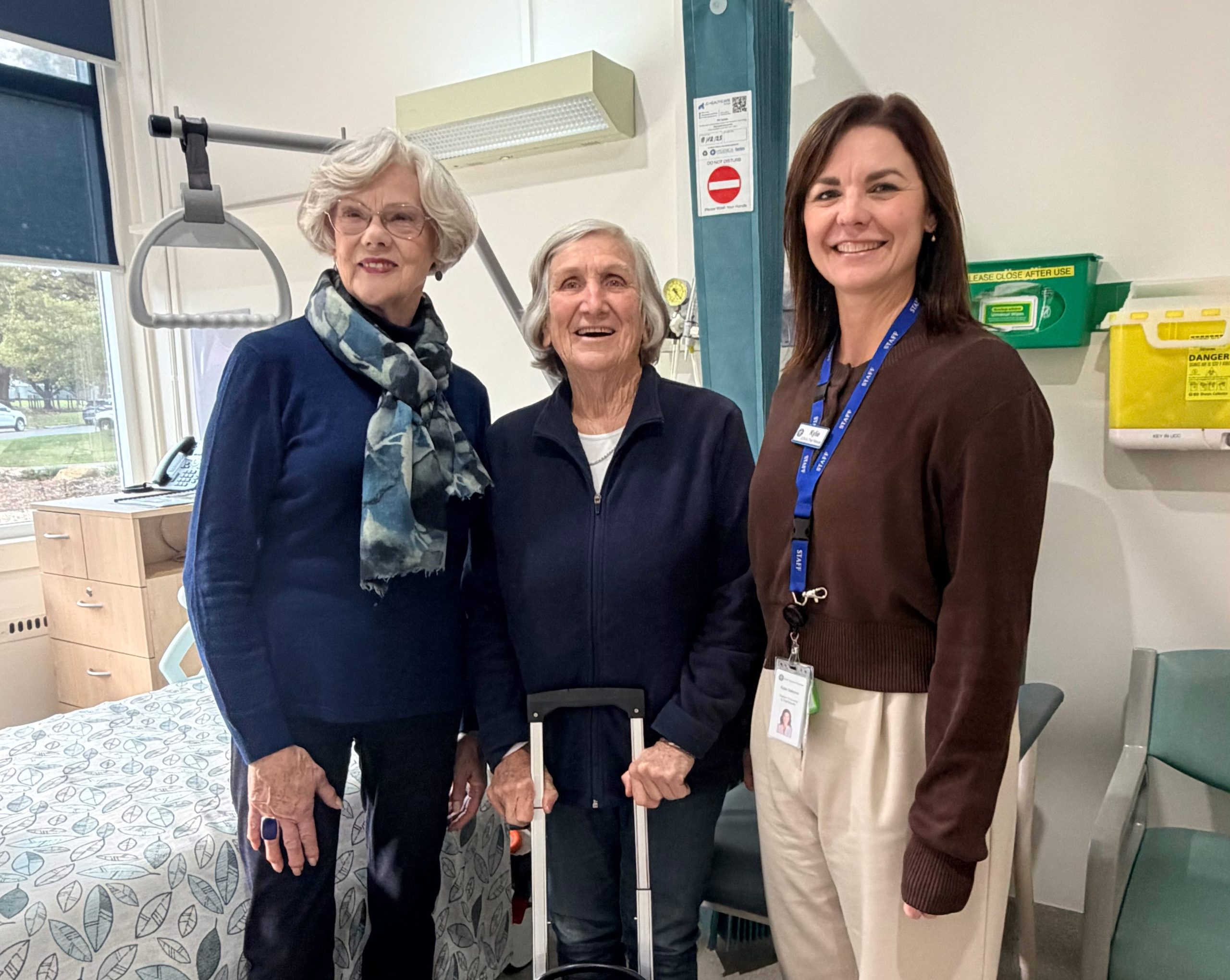Three SGH hospital staff with the donated oxygen concentrator
